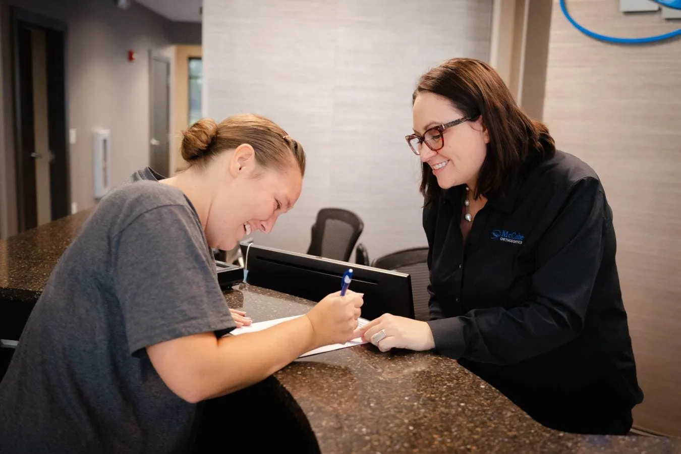 Happy patient checking in